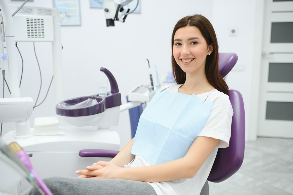 All-On-X Consultation in Irvine: Patient Seated in the Treatment Chair Dental patient seated in the treatment chair before her appointment at our Irvine dental office